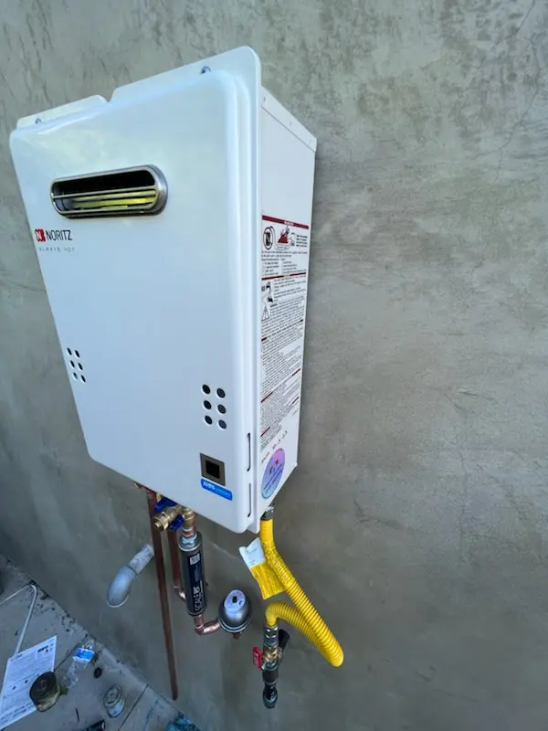Tankless water heater installation for Brigadoon Village homes